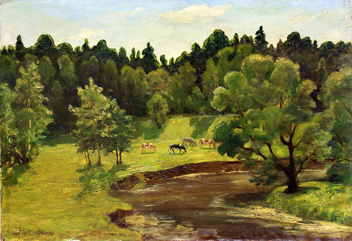 Коровы на лугу у реки