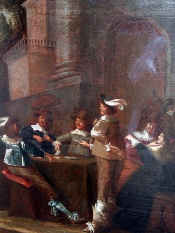 Элегантная компания, играющая в карты