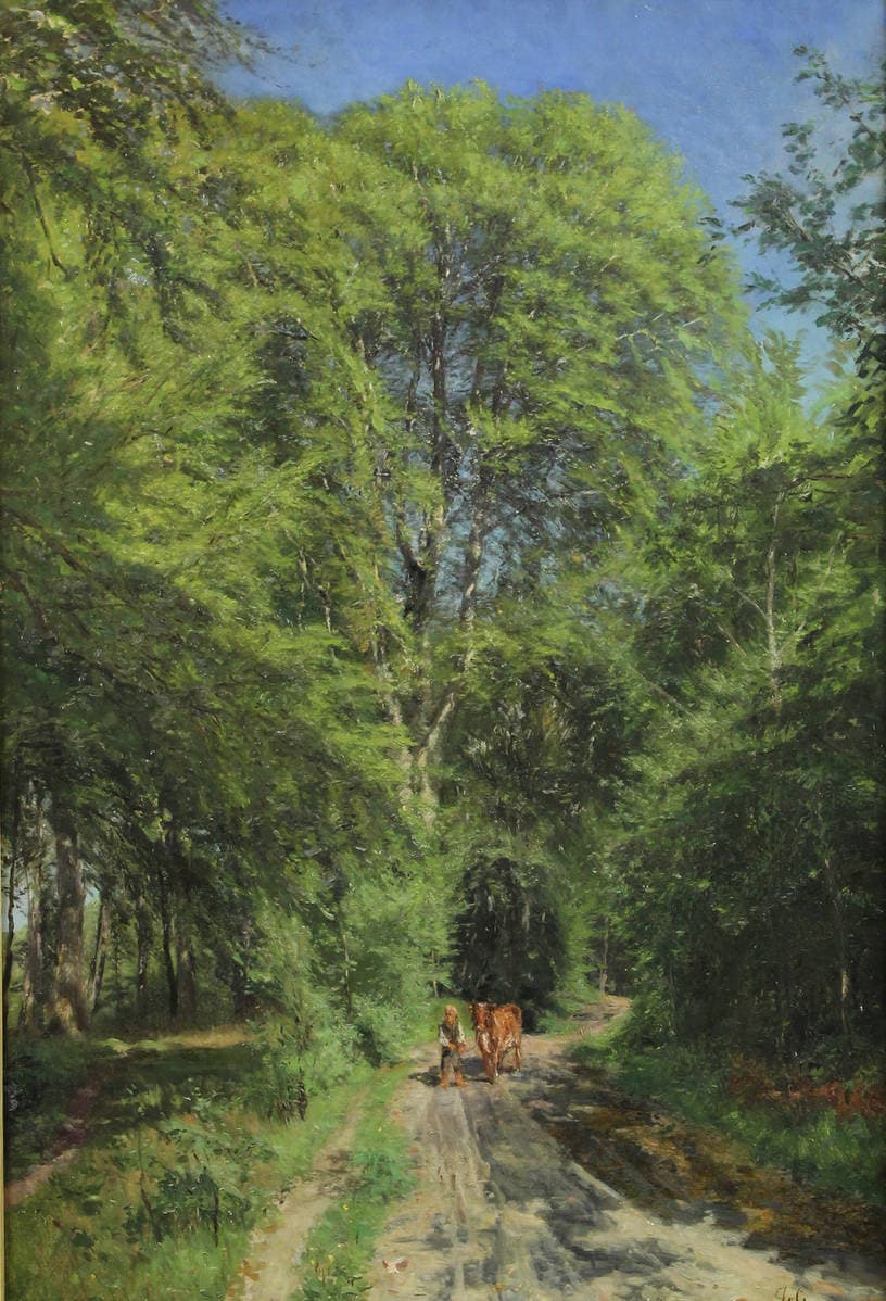 Мальчик с коровой в лесу