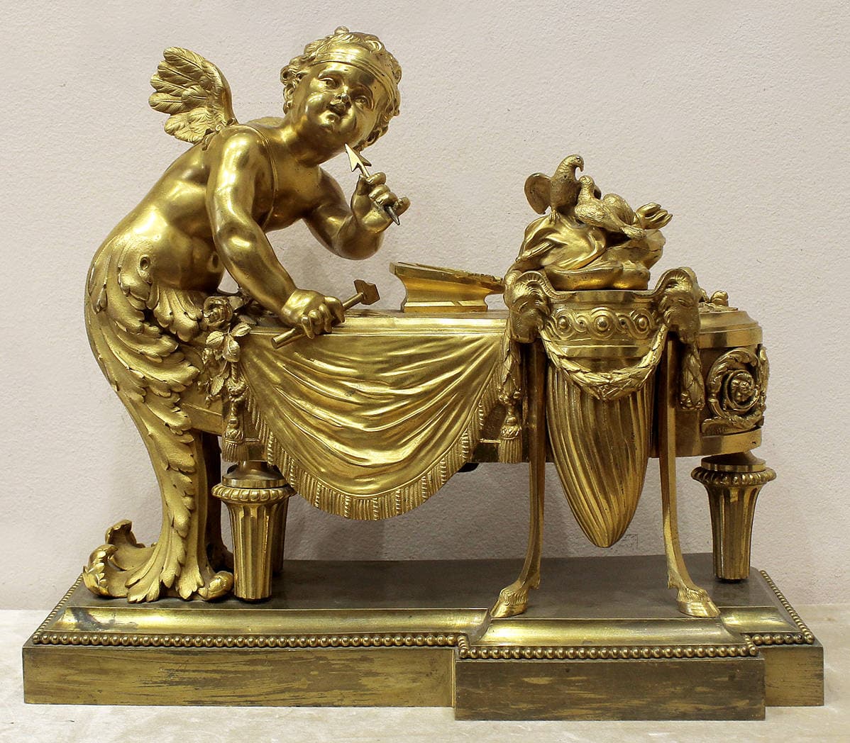 Бронзовая скульптура “Амур -бог любви точит стрелы”