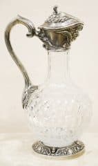 Серебряный кувшин с путти, листьями аканта и картушами