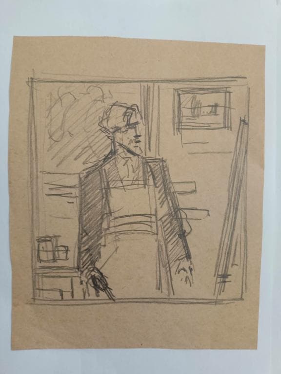 Художник, стоящий перед мольбертом