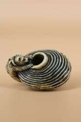 Кошка с плетенкой