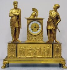 Старинные каминные часы в стиле ампир с фигурами воина и философа